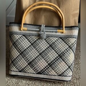 Elegant Woven Handbag with Bamboo Handles‎